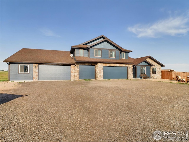 view of front of property with a garage