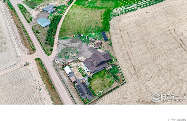 birds eye view of property featuring a rural view