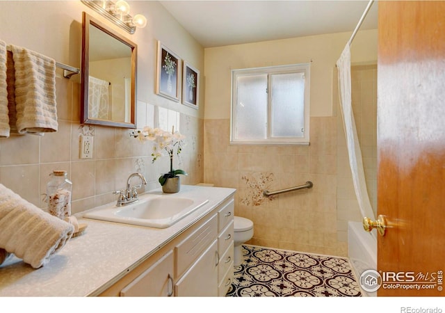 full bathroom with tile patterned flooring, toilet, tile walls, and shower / bath combo with shower curtain