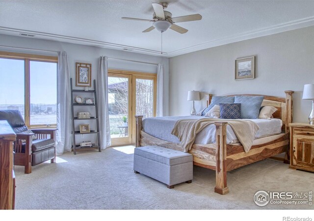 carpeted bedroom with ceiling fan, ornamental molding, a textured ceiling, and access to outside