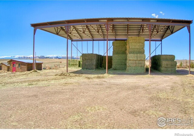 exterior space featuring a carport