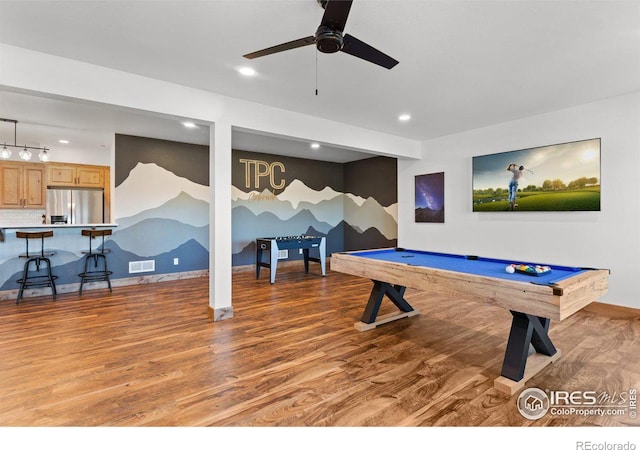 game room featuring hardwood / wood-style flooring, ceiling fan, and billiards