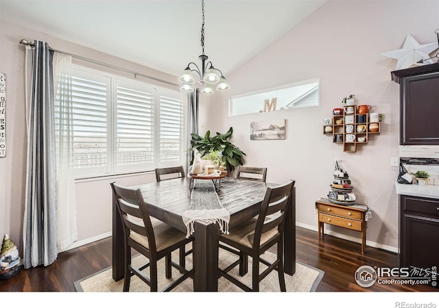 dining area featuring lofted ceiling, dark hardwood / wood-style floors, an inviting chandelier, and a healthy amount of sunlight