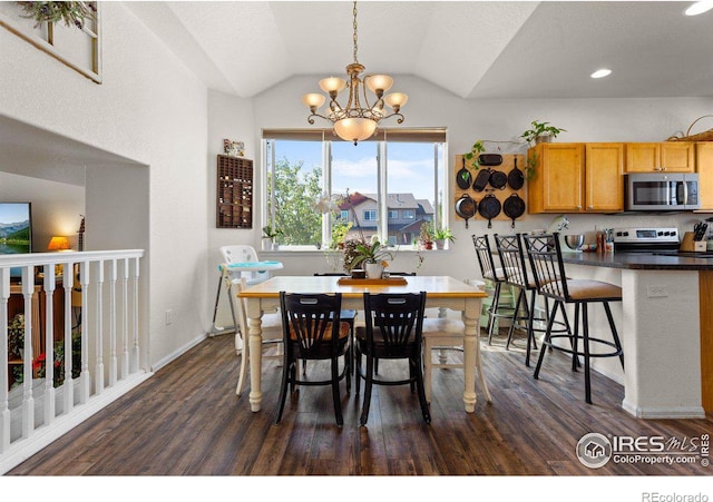 dining room with dark hardwood / wood-style flooring, an inviting chandelier, and lofted ceiling