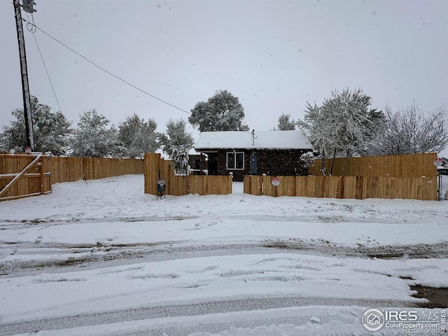 view of yard covered in snow