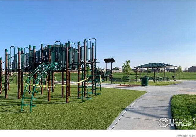 community play area featuring a yard and a gazebo