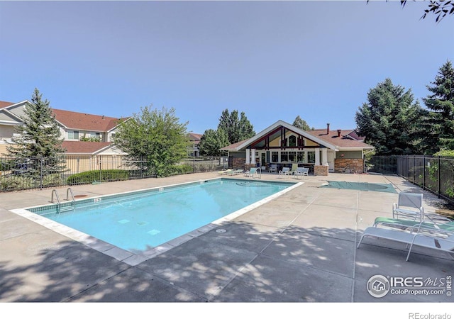 view of pool with a patio area