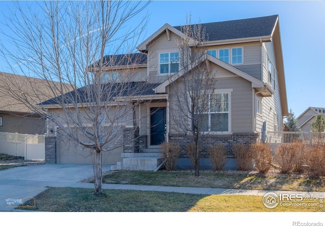 craftsman-style home featuring a garage