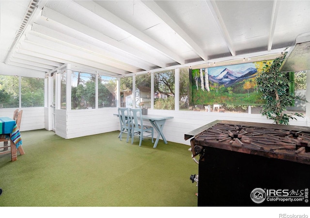 sunroom / solarium with vaulted ceiling