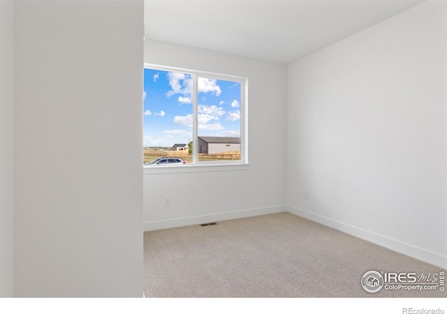 empty room with light carpet