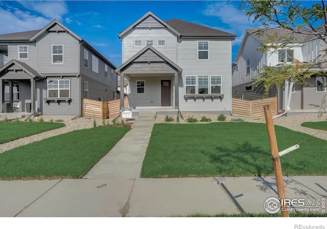 view of front of home featuring a front lawn