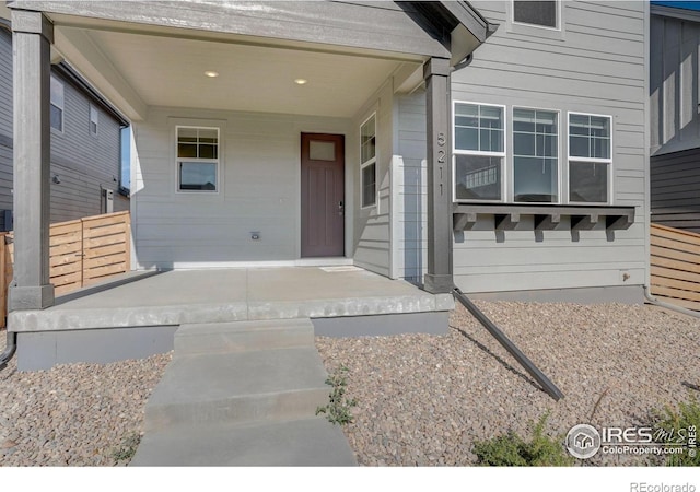 doorway to property with covered porch