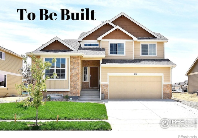 craftsman-style home with a garage and a front lawn