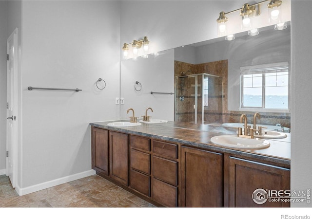 bathroom with vanity and an enclosed shower