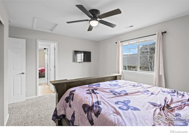 carpeted bedroom with ceiling fan