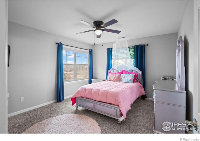 bedroom with ceiling fan and carpet floors