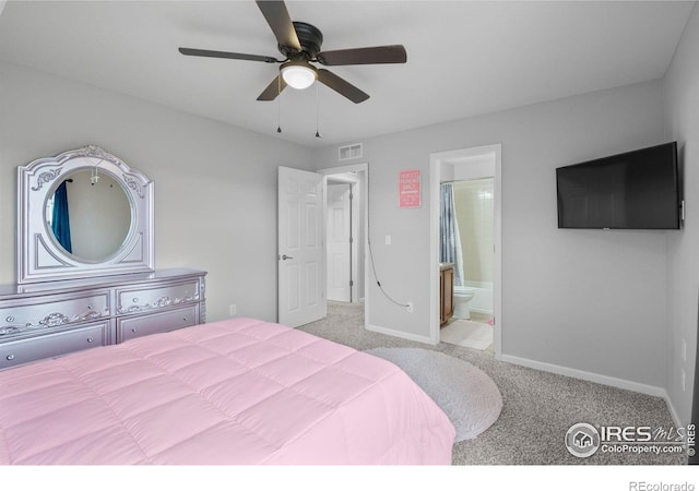 carpeted bedroom featuring ensuite bathroom and ceiling fan