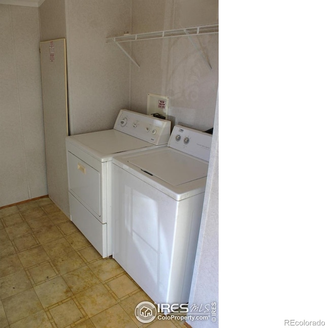 laundry area featuring washer and clothes dryer