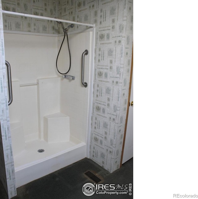 bathroom featuring walk in shower