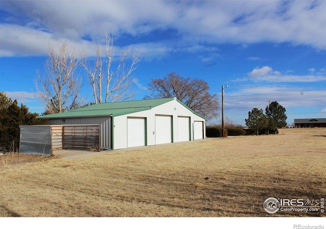 view of outbuilding featuring a garage