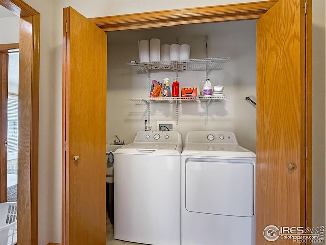 laundry room featuring separate washer and dryer