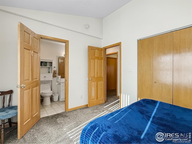 carpeted bedroom with a closet