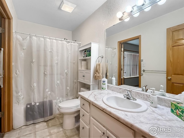 full bathroom featuring vanity, toilet, and shower / tub combo