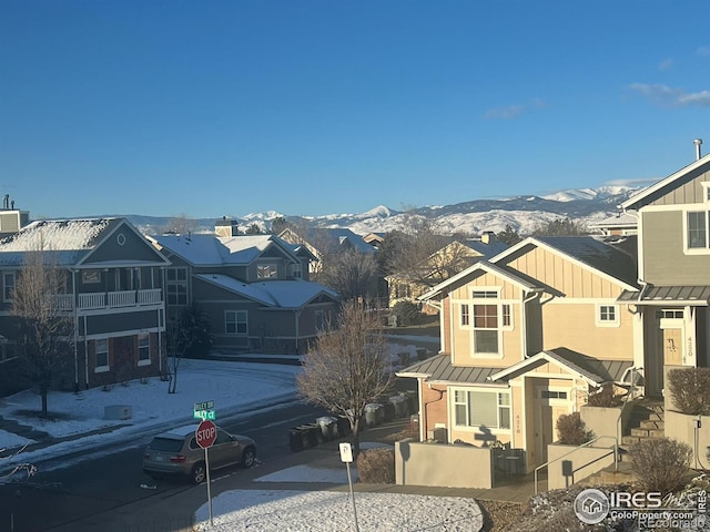 view of front of property with a mountain view