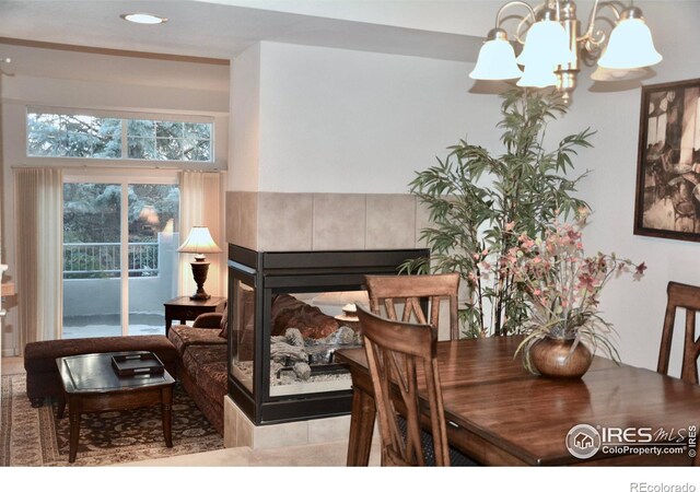 dining area featuring an inviting chandelier