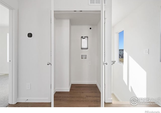 corridor featuring hardwood / wood-style flooring