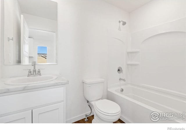 full bathroom featuring vanity,  shower combination, and toilet