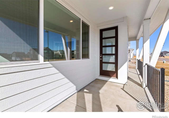 doorway to property featuring a balcony