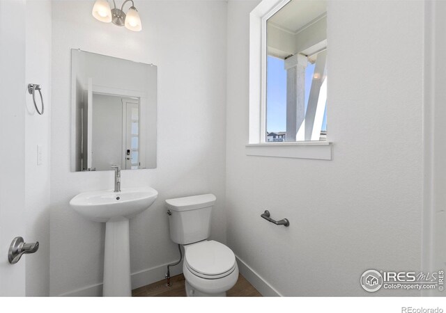 bathroom with sink and toilet