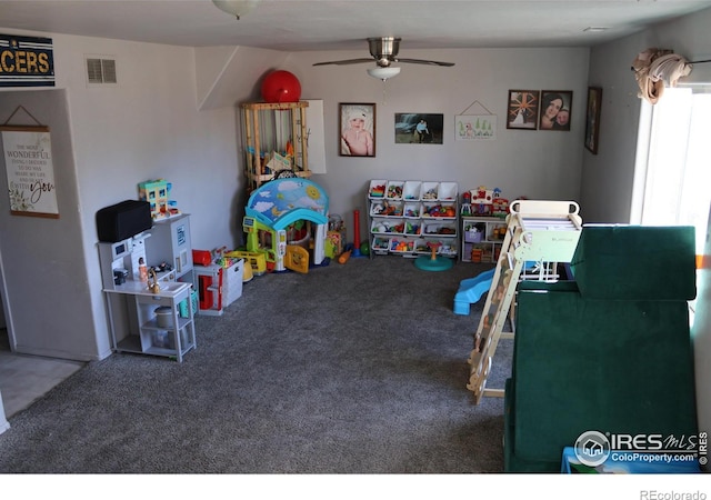 recreation room featuring carpet floors and ceiling fan