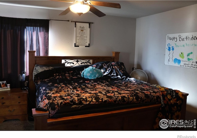 bedroom featuring ceiling fan