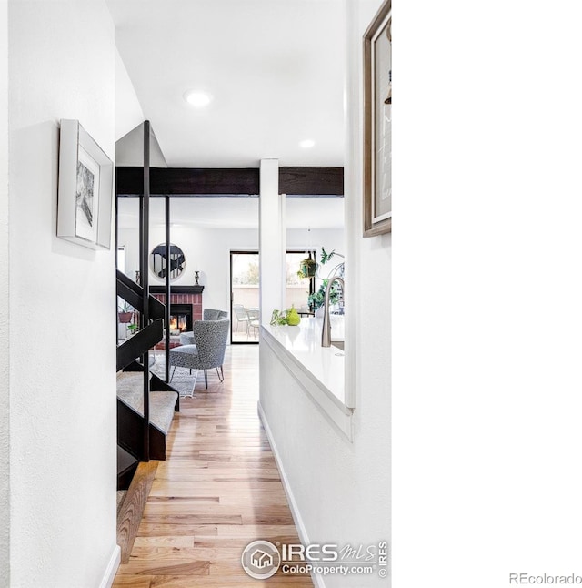 hallway featuring light wood-type flooring