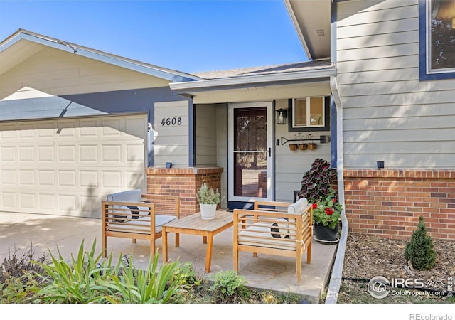 view of patio featuring a garage