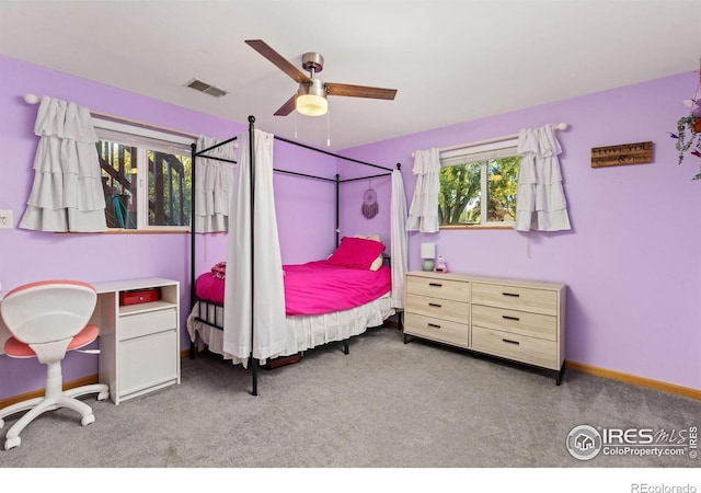 carpeted bedroom featuring ceiling fan