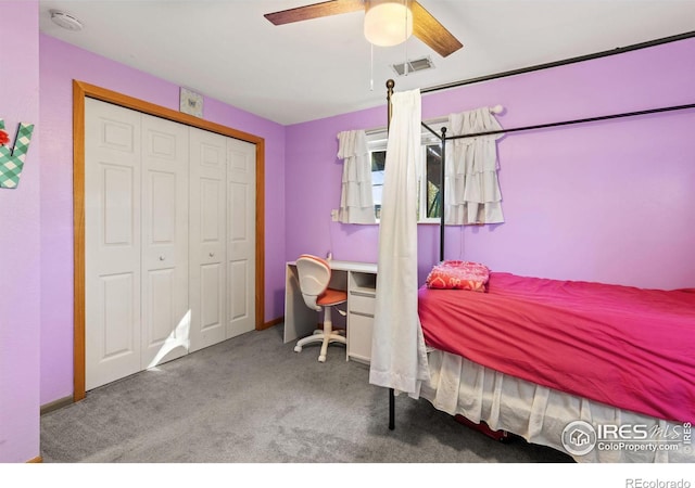 bedroom featuring ceiling fan, a closet, and carpet floors