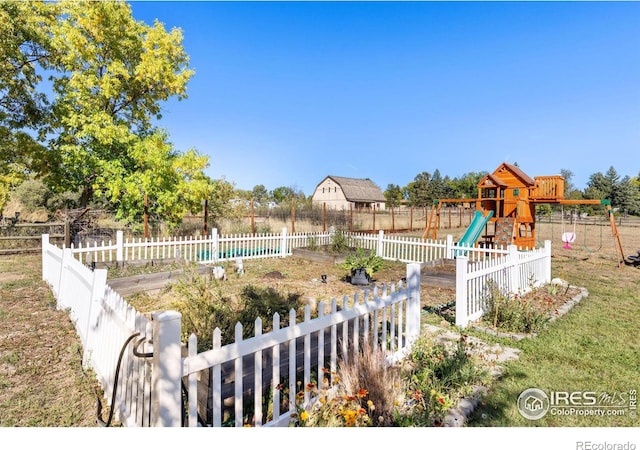 view of yard with a playground