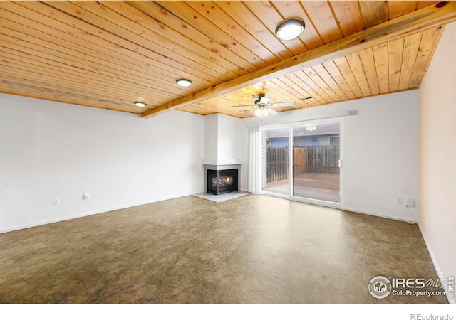 unfurnished living room with beamed ceiling, ceiling fan, a multi sided fireplace, and wood ceiling