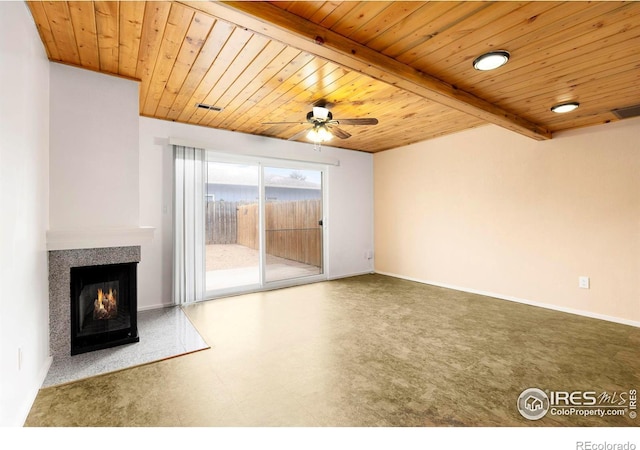 unfurnished living room with beamed ceiling, ceiling fan, and wooden ceiling