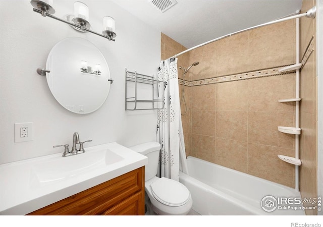 full bathroom with shower / bathtub combination with curtain, vanity, and toilet