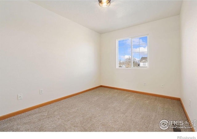 view of carpeted spare room