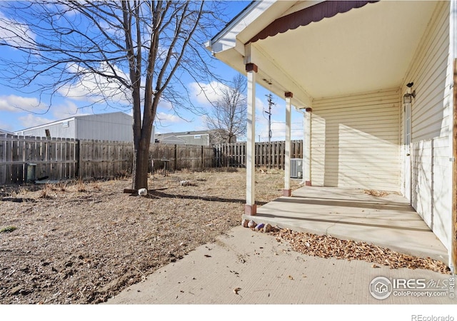 view of yard with central AC