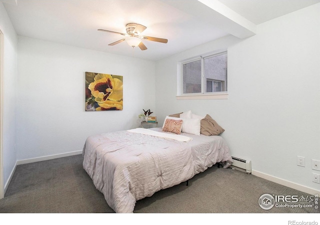 carpeted bedroom with ceiling fan and a baseboard radiator