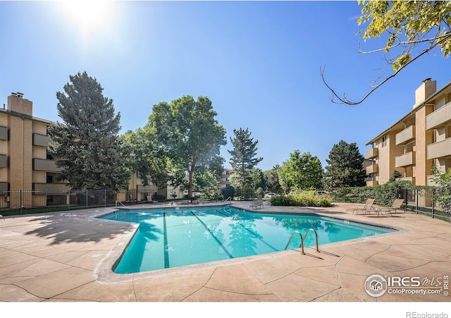 view of pool with a patio