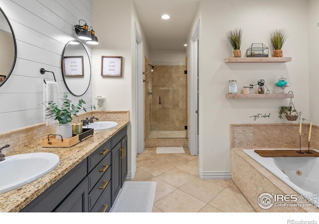 bathroom with tile patterned flooring, vanity, independent shower and bath, and tasteful backsplash