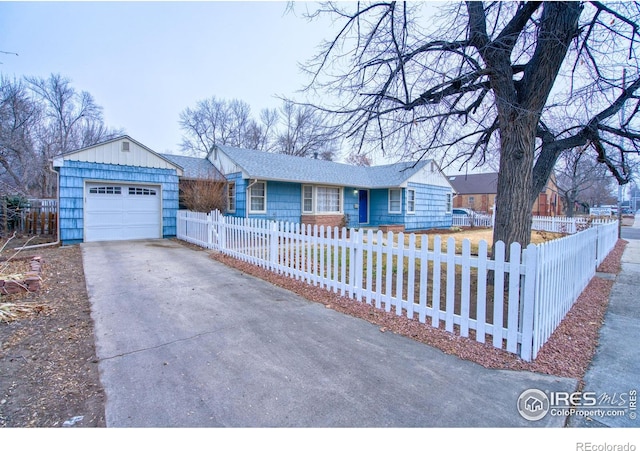 ranch-style home featuring a garage