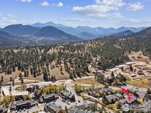 drone / aerial view featuring a mountain view